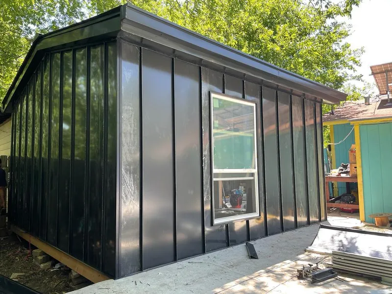 Black standing seam metal wall panels for Metal Roof Installation in Bruce